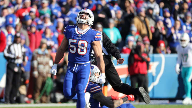 Milano celebrates a big play in front of the home crowd.
